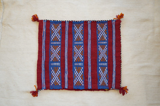 Coussin berbère pompons